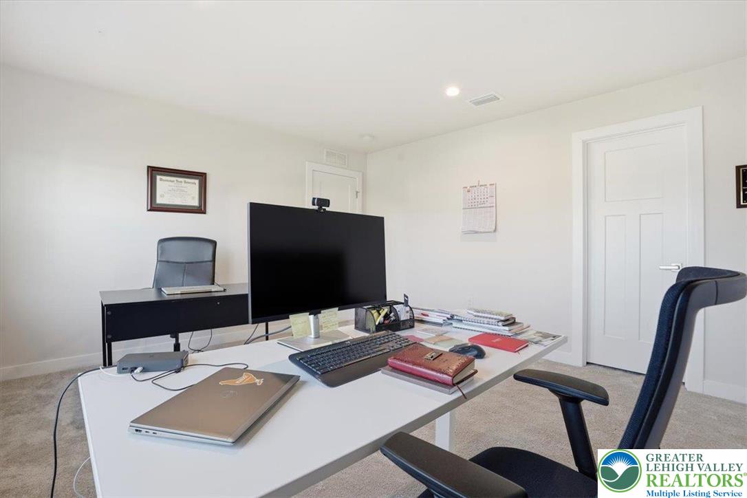 3902 Orth Street Bethlehem, PA 18020 - Photo 35 of 62 a work room with furniture and wooden floor