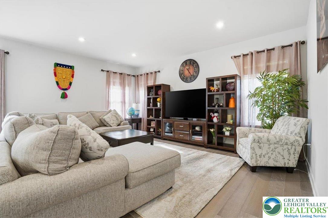 3902 Orth Street Bethlehem, PA 18020 - Photo 3 of 62 a living room with furniture and a flat screen tv