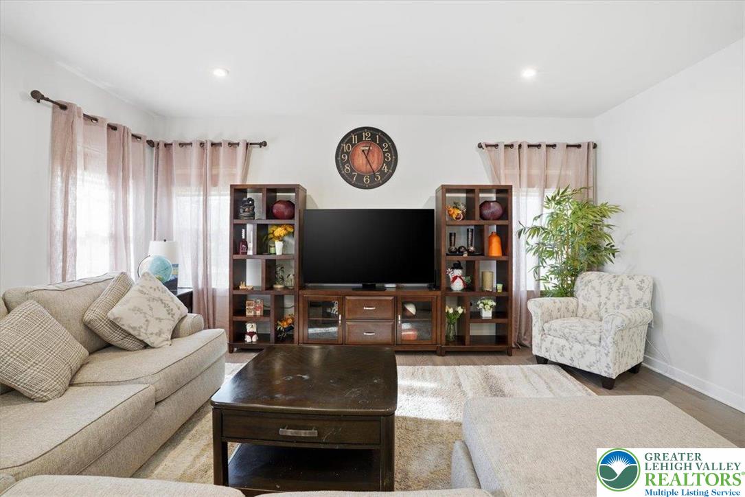3902 Orth Street Bethlehem, PA 18020 - Photo 4 of 62 a living room with furniture and a flat screen tv