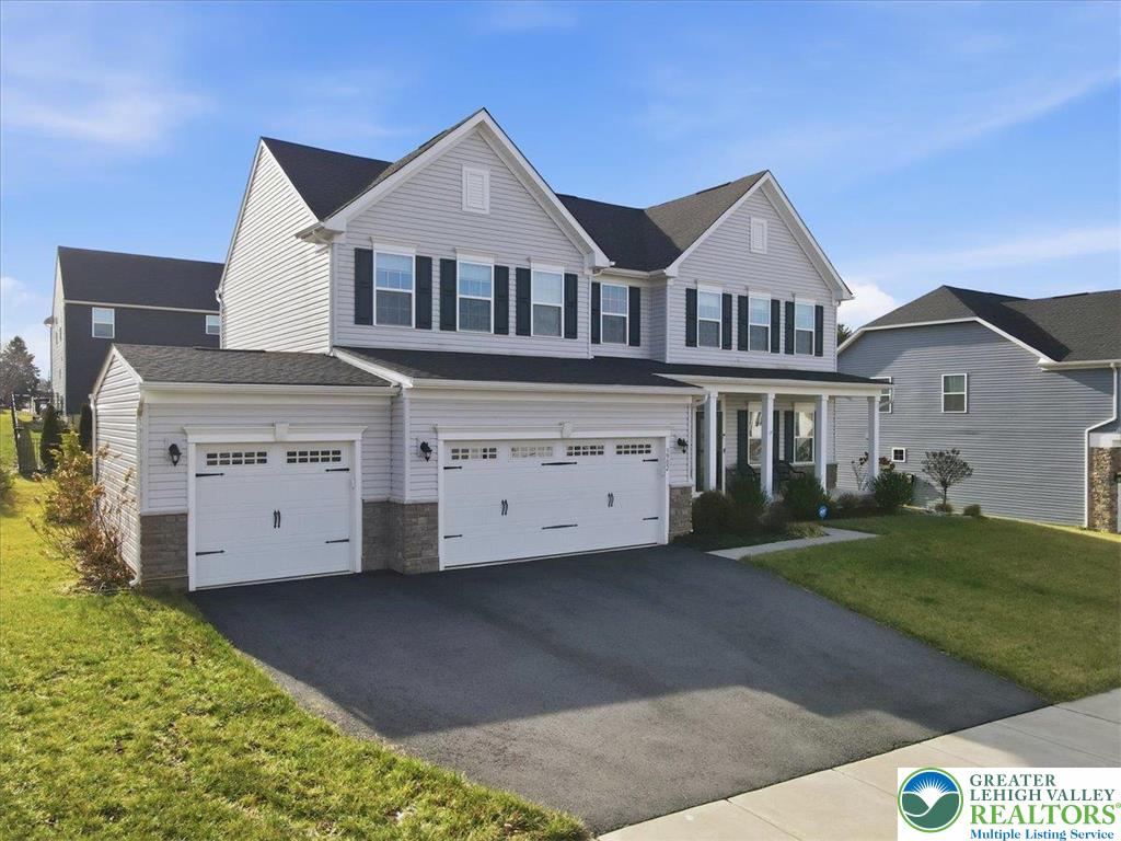 3902 Orth Street Bethlehem, PA 18020 - Photo 50 of 62 a view of a white house with a yard