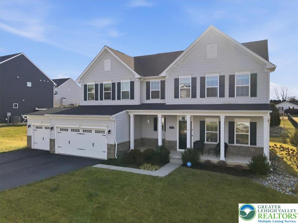 3902 Orth Street Bethlehem, PA 18020 - Photo 51 of 62 a front view of a house with a garden