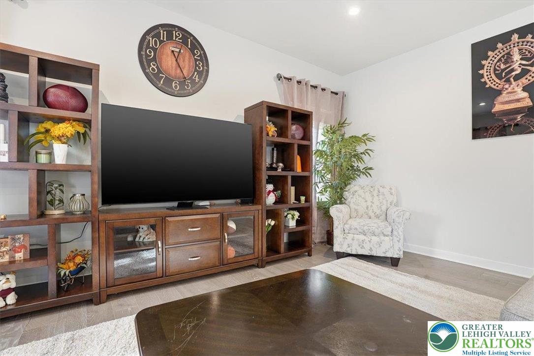 3902 Orth Street Bethlehem, PA 18020 - Photo 5 of 62 a living room with furniture and painting on the wall