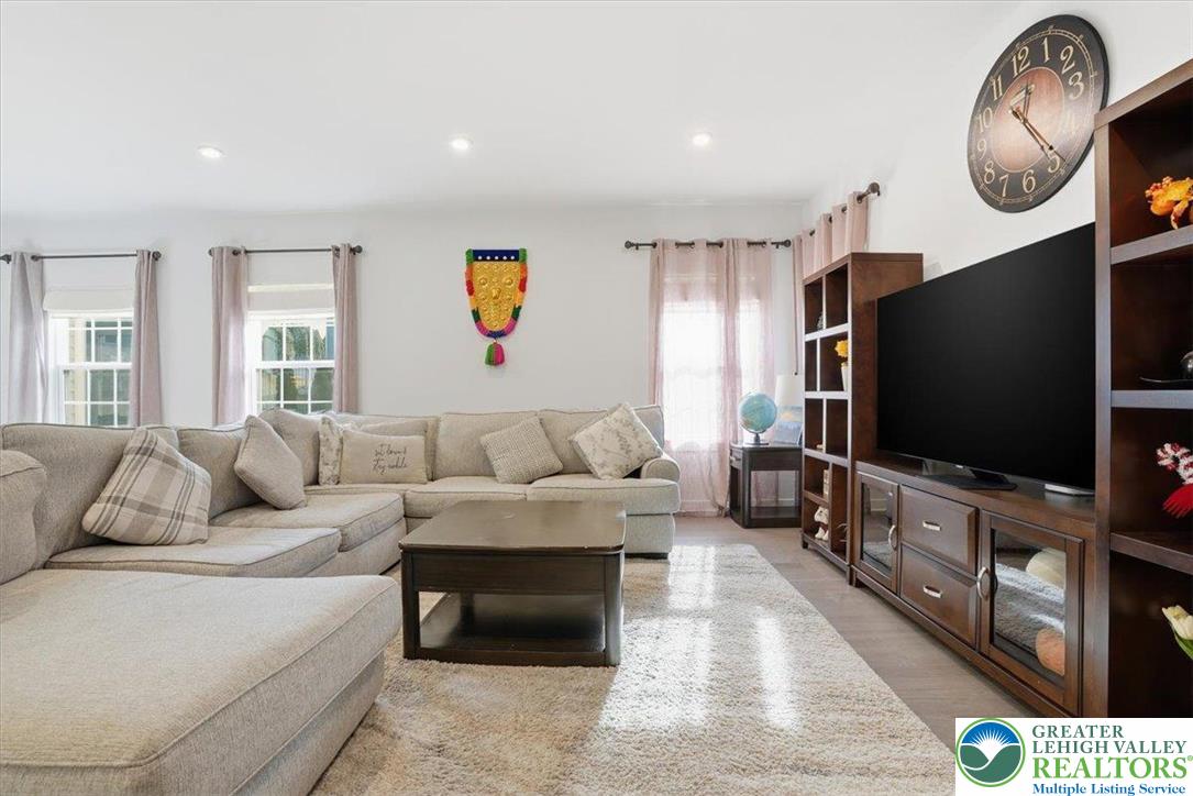 3902 Orth Street Bethlehem, PA 18020 - Photo 6 of 62 a living room with furniture and a flat screen tv