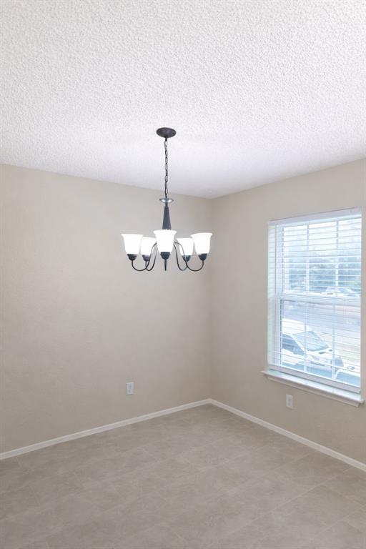 620 Race Street, Unit D Crowley, TX 76036 - Photo 5 of 20 a view of empty room with window
