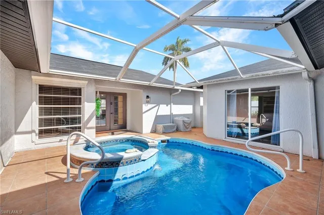 a view of a lounge chair in the patio of a house