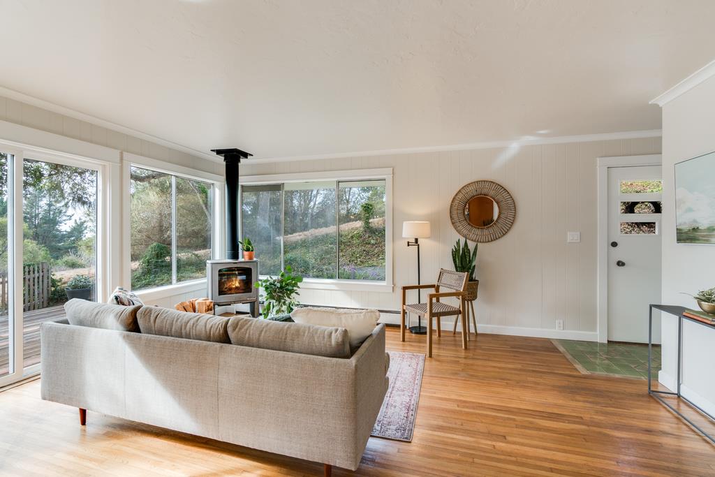 94 Robak Drive La Selva Beach, CA 95076 - Photo 2 of 24 a living room with furniture and a large window