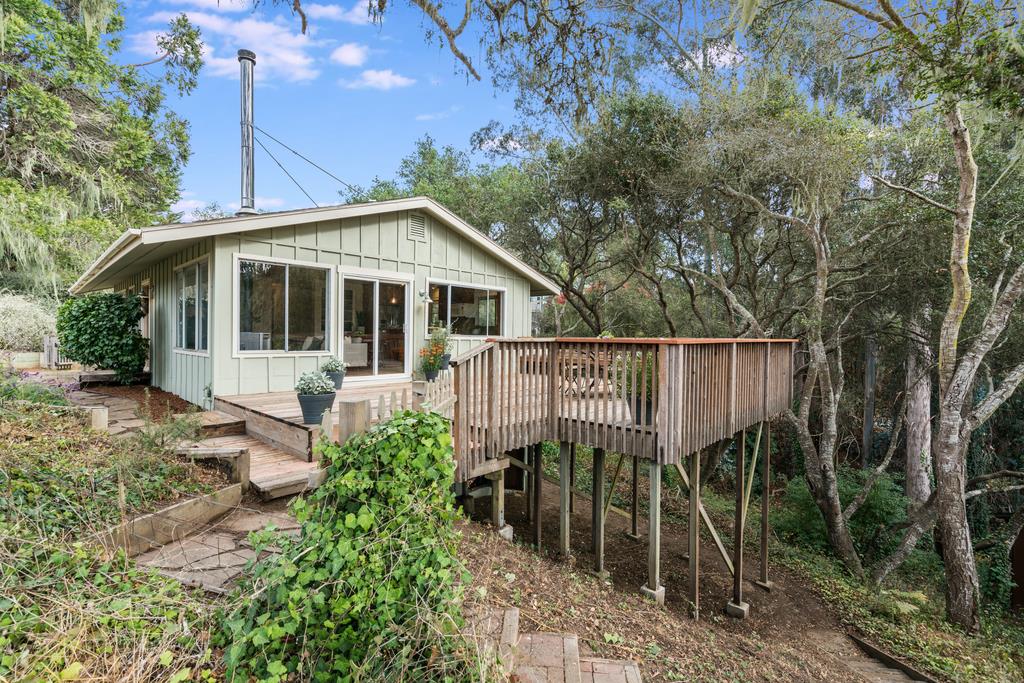 94 Robak Drive La Selva Beach, CA 95076 - Photo 23 of 24 a front view of a house with a garden