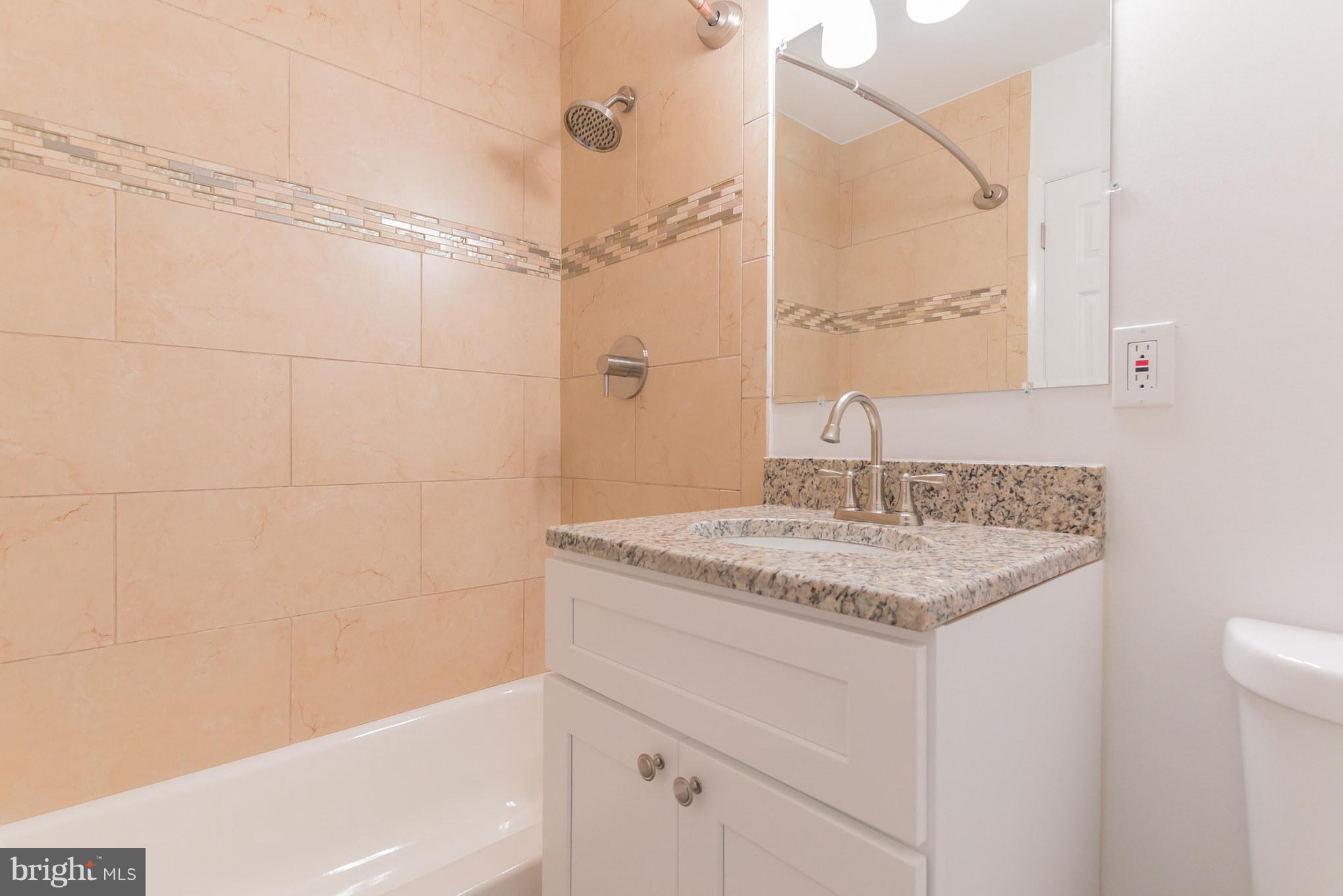 1715 Ballenger Creek Pike Point of Rocks, MD 21777 - Photo 16 of 30 Secondary bathroom with granite, tile, upgraded