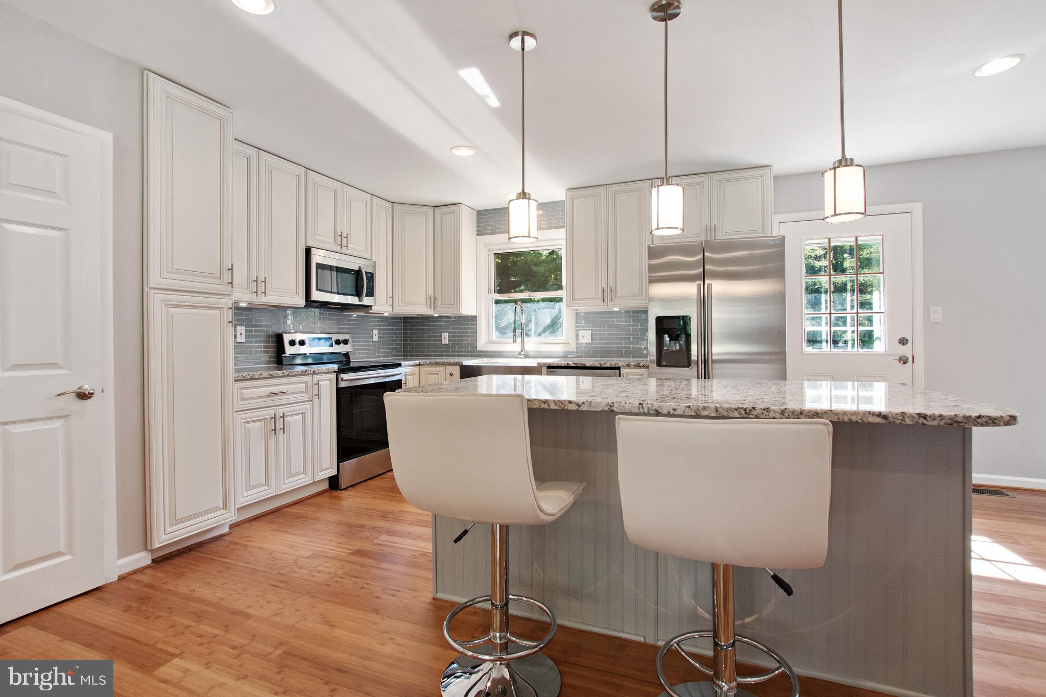 1715 Ballenger Creek Pike Point of Rocks, MD 21777 - Photo 6 of 30 Large granite island seats 4 comfortably