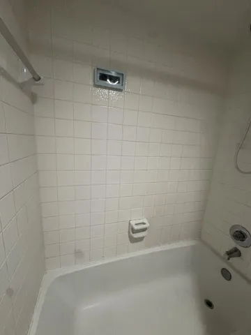 a close up of a bathtub