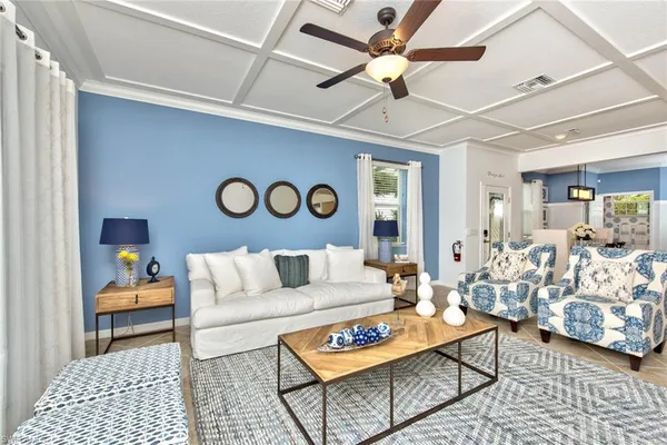 a living room with furniture and a table