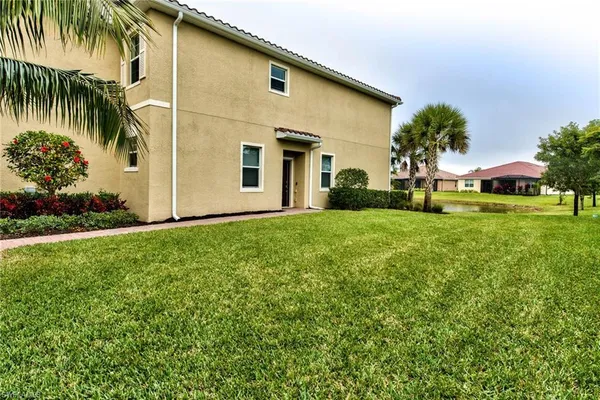 front view of a house with a garden
