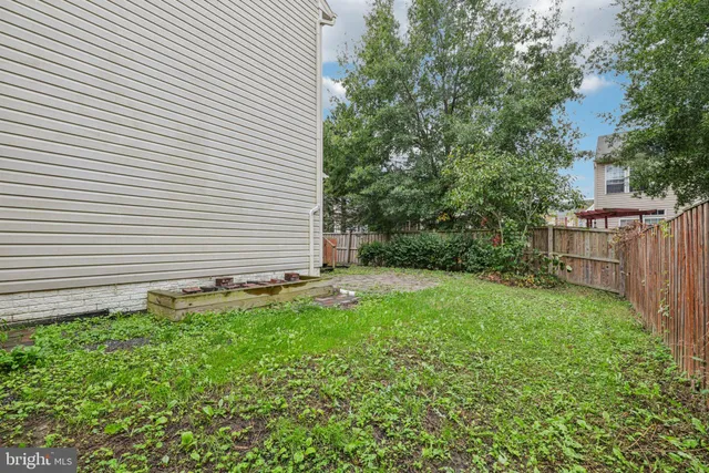a view of a backyard with a garden