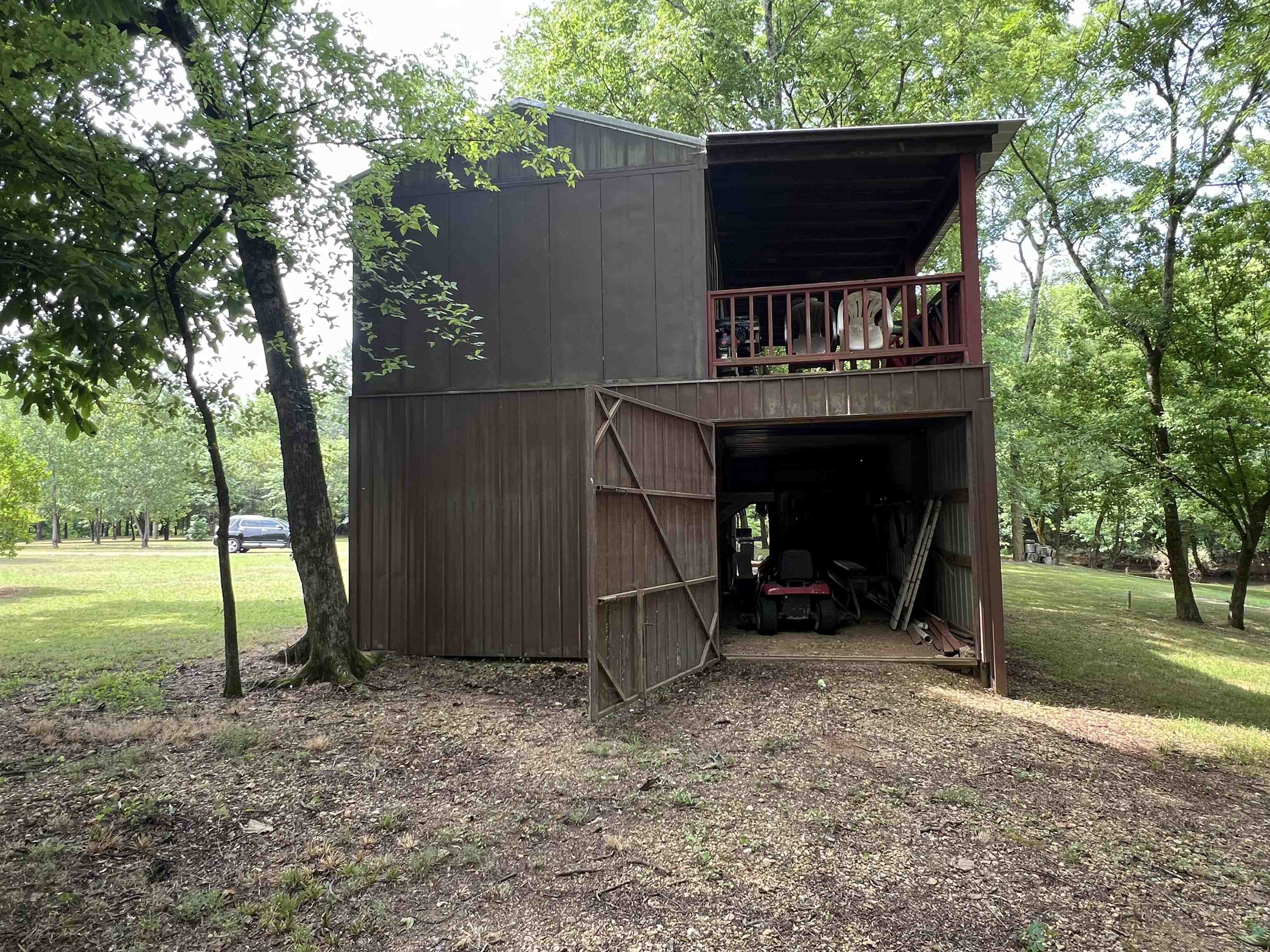 590 Towboat Lane Adamsville, TN 38310 - Photo 12 of 39 a view of a backyard