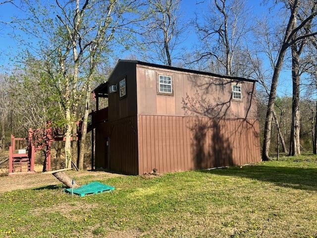 590 Towboat Lane Adamsville, TN 38310 - Photo 16 of 39 View of yard featuring a shed