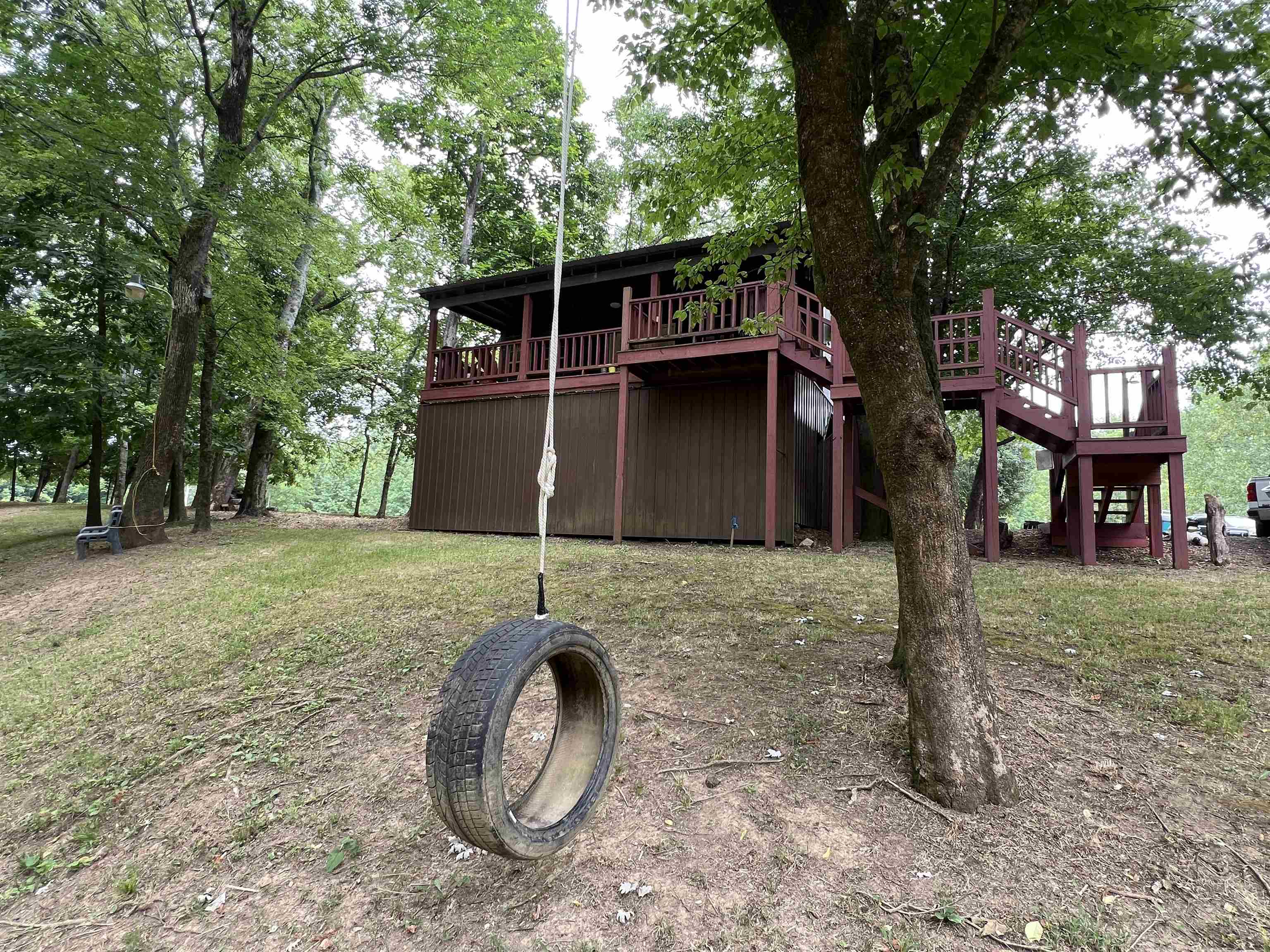 590 Towboat Lane Adamsville, TN 38310 - Photo 18 of 39 a backyard of a house with lots of green space