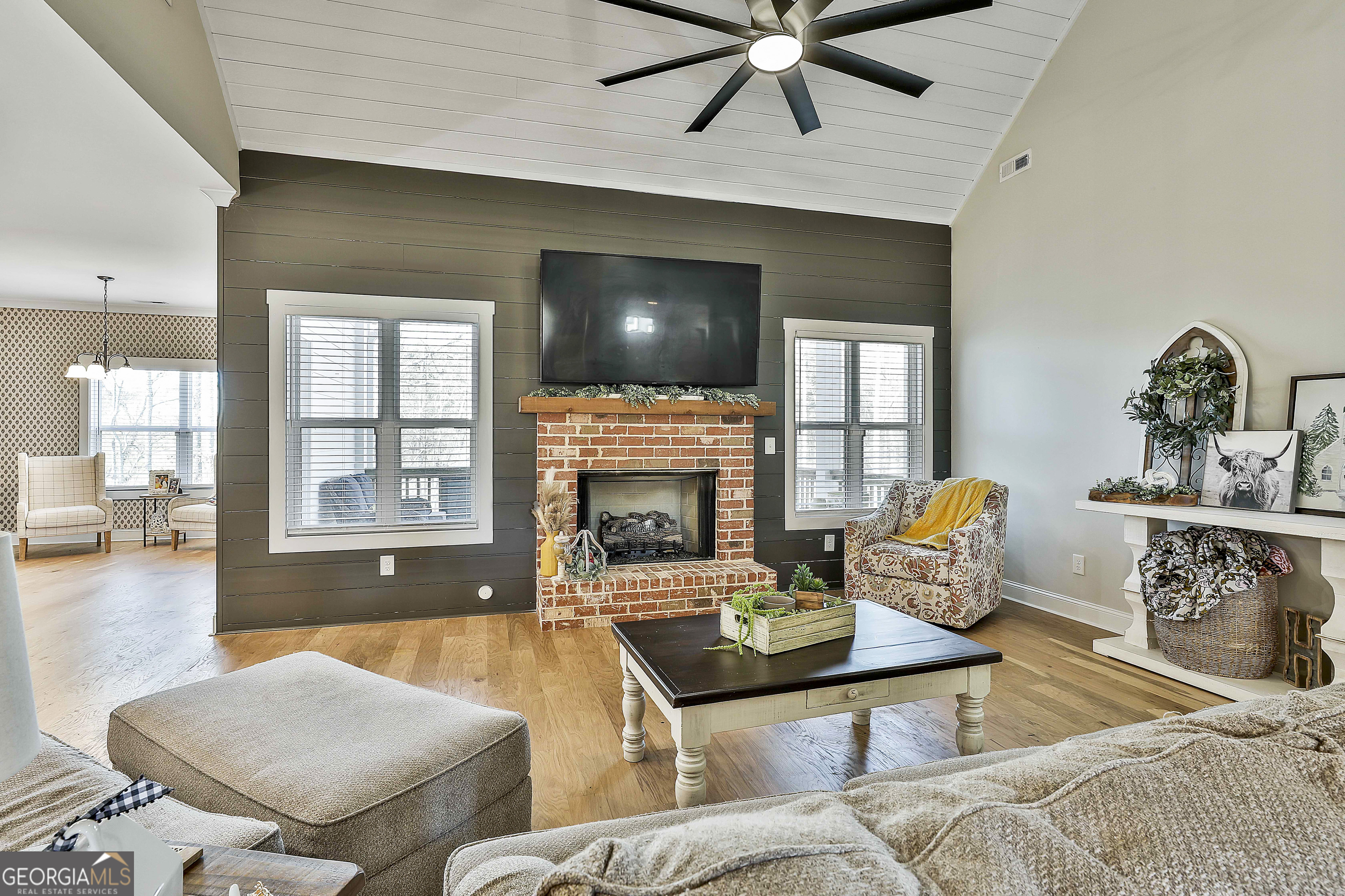 255 Werner Way Senoia, GA 30276 - Photo 14 of 47 a living room with furniture and a fireplace