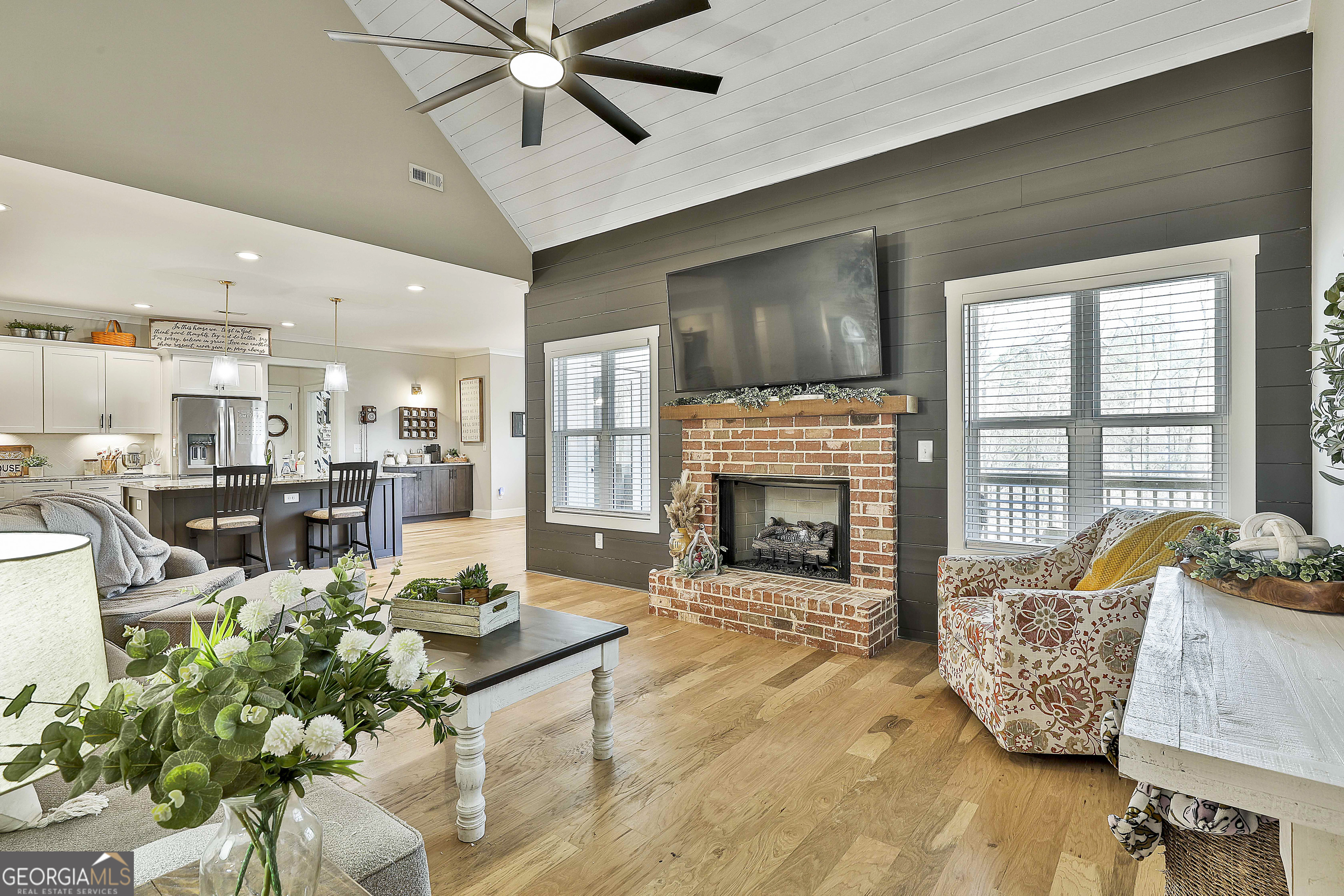 255 Werner Way Senoia, GA 30276 - Photo 15 of 47 a living room with furniture fireplace and flat screen tv