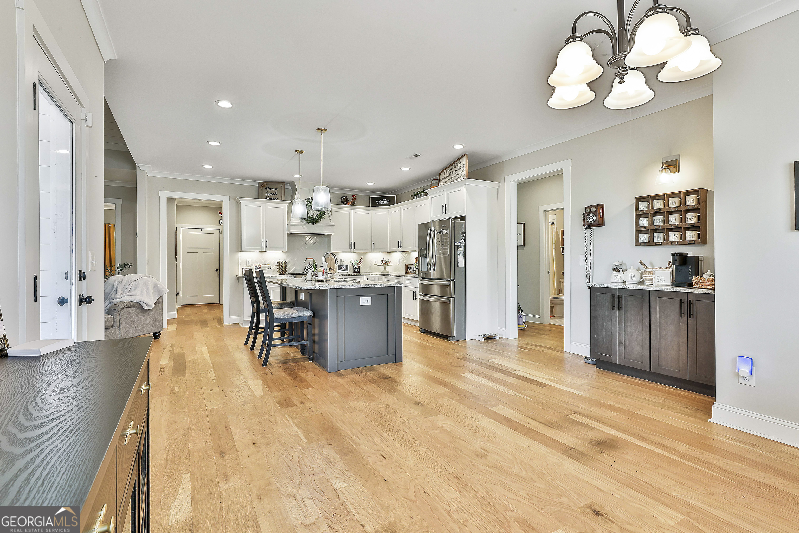 255 Werner Way Senoia, GA 30276 - Photo 24 of 47 a view of a kitchen and dining room