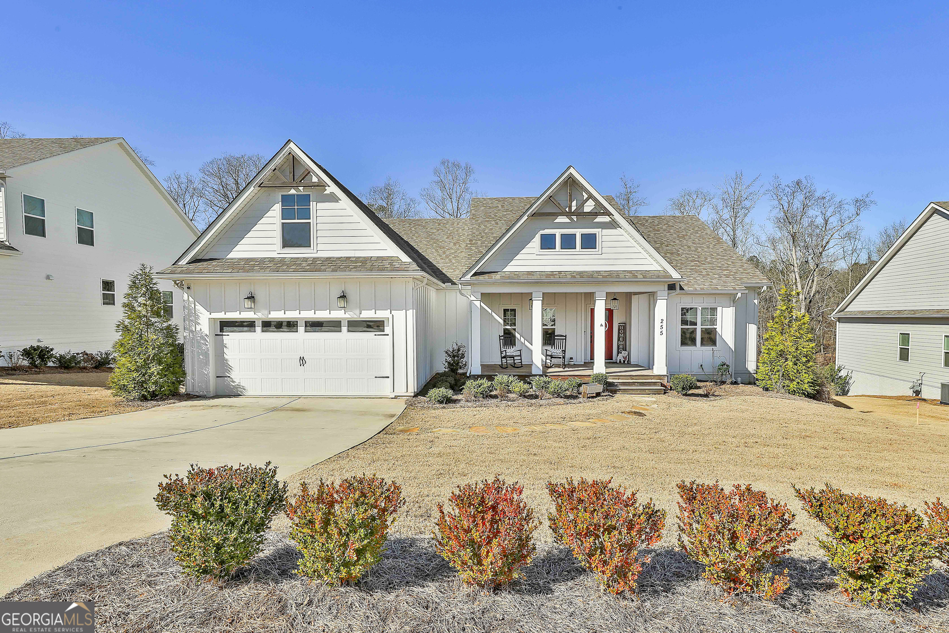 255 Werner Way Senoia, GA 30276 - Photo 3 of 47 a front view of a house with a yard