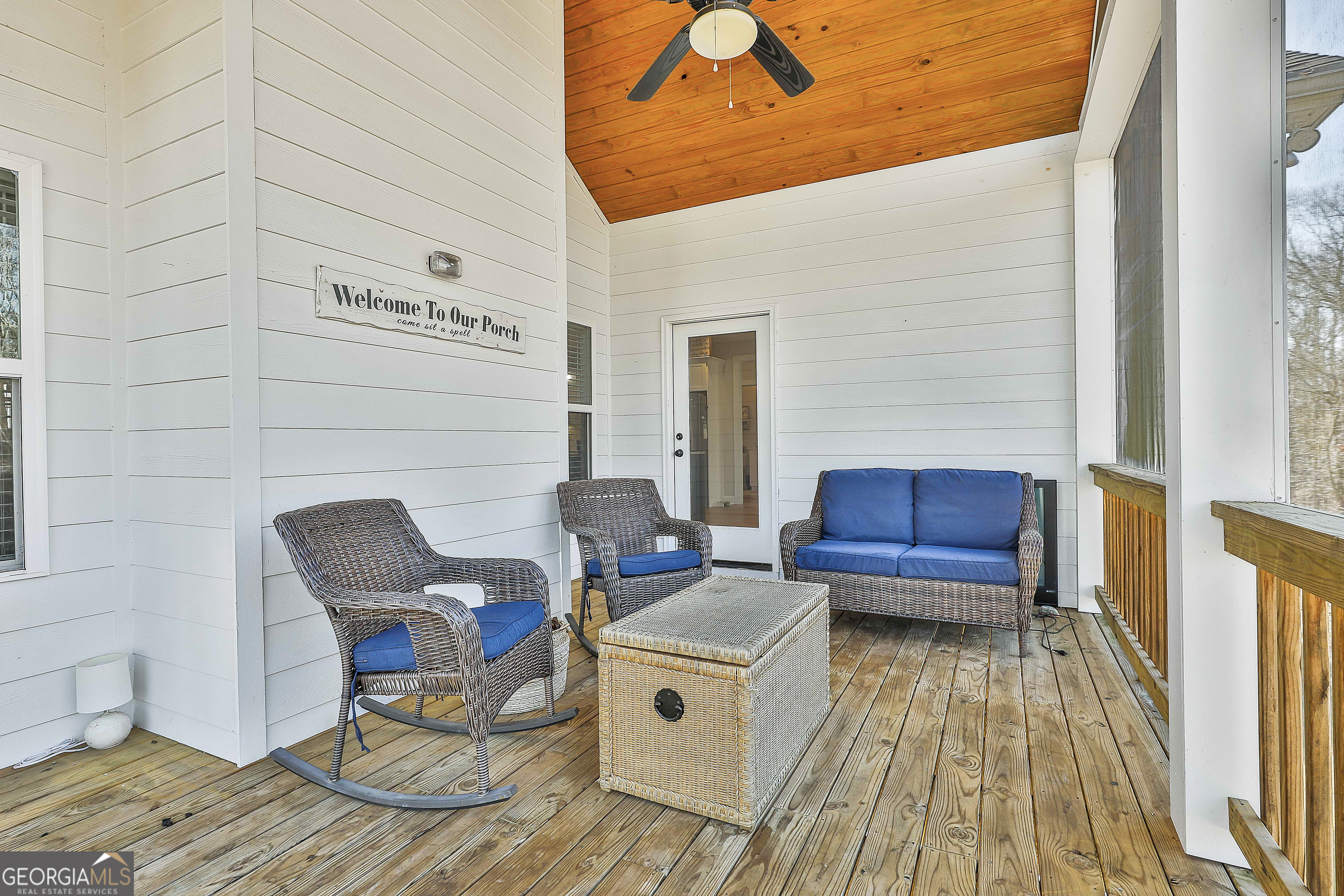 255 Werner Way Senoia, GA 30276 - Photo 38 of 47 a view of a chairs in wooden deck