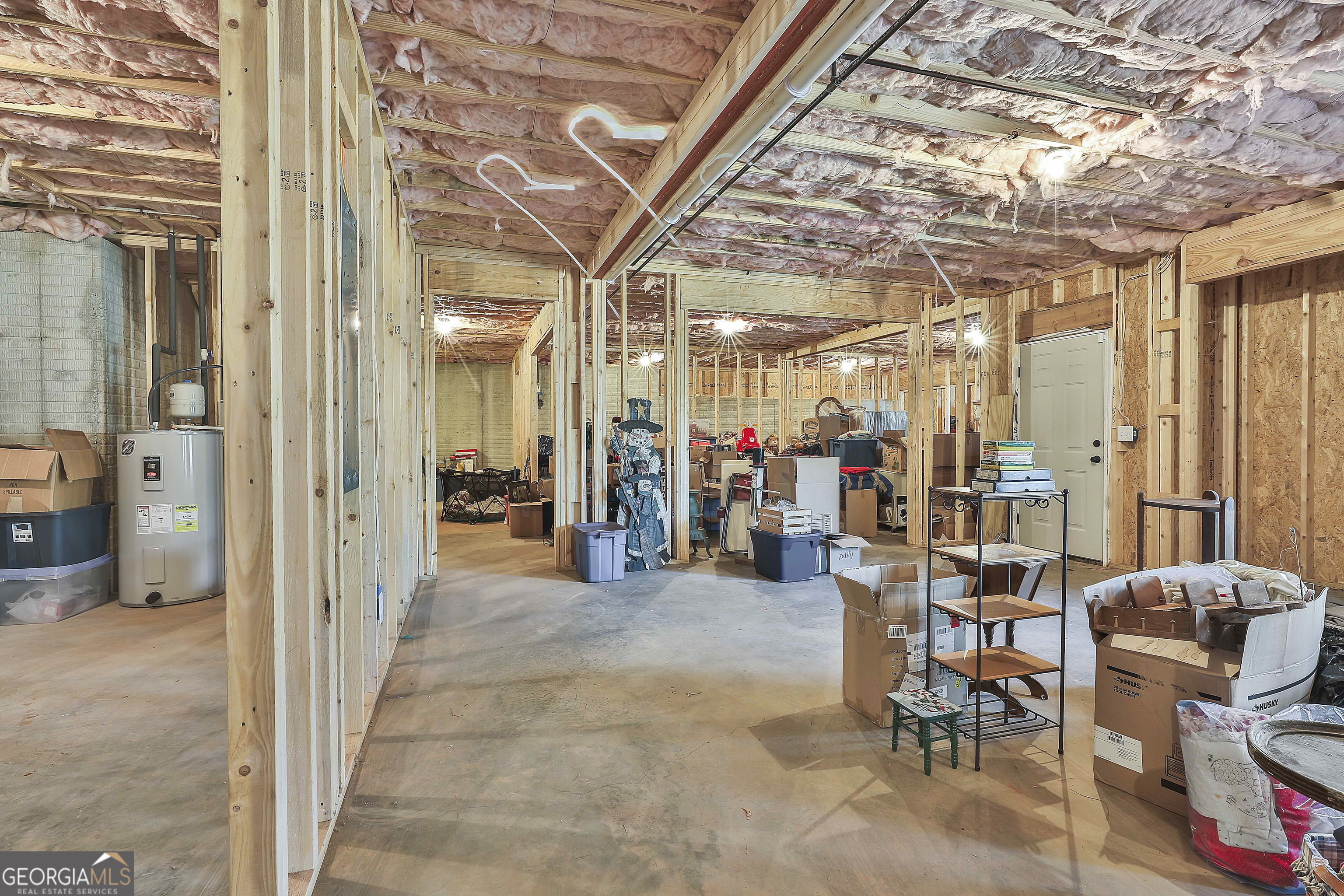255 Werner Way Senoia, GA 30276 - Photo 40 of 47 a view of a hallway with dining area and glass windows
