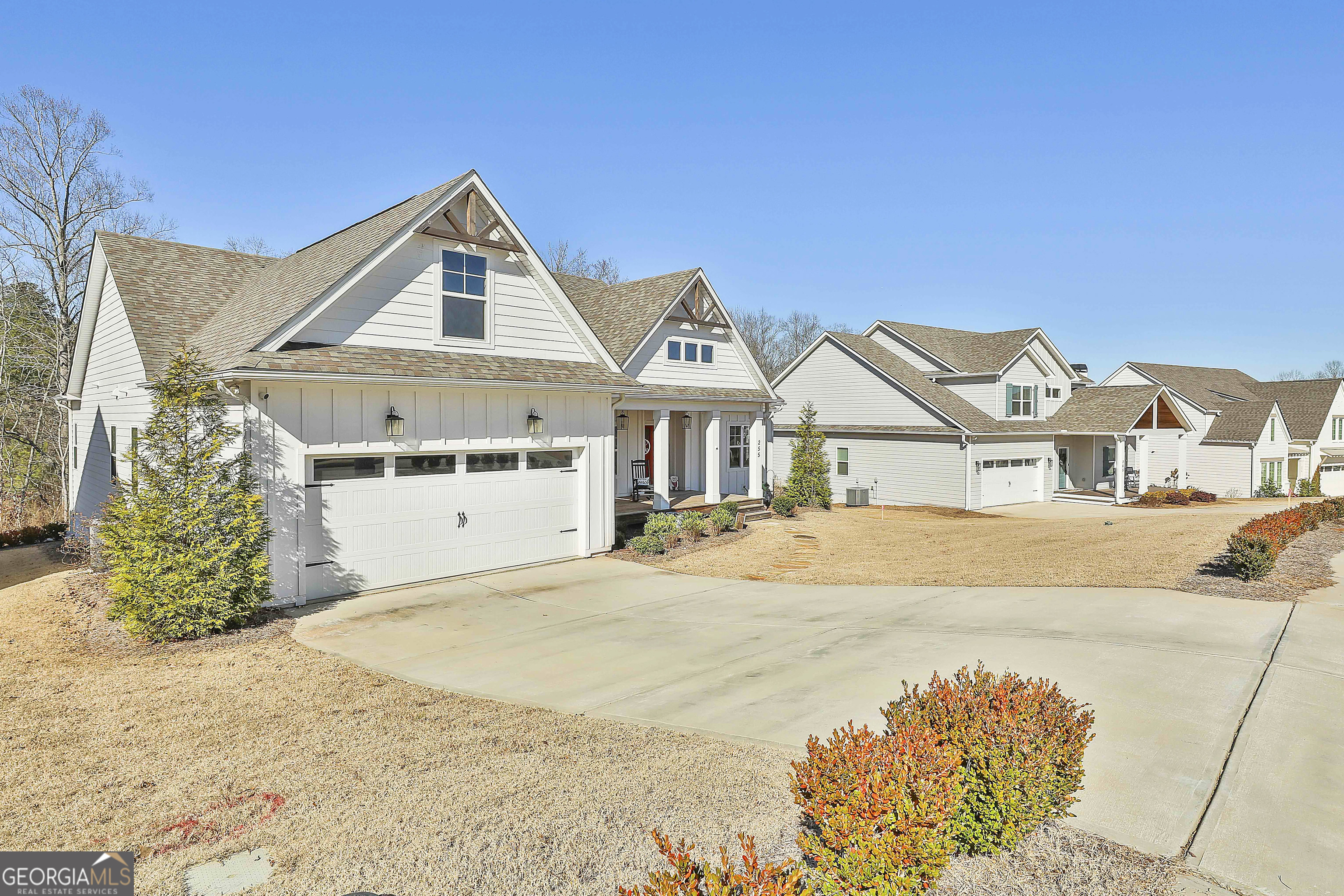 255 Werner Way Senoia, GA 30276 - Photo 5 of 47 a front view of a house with a yard
