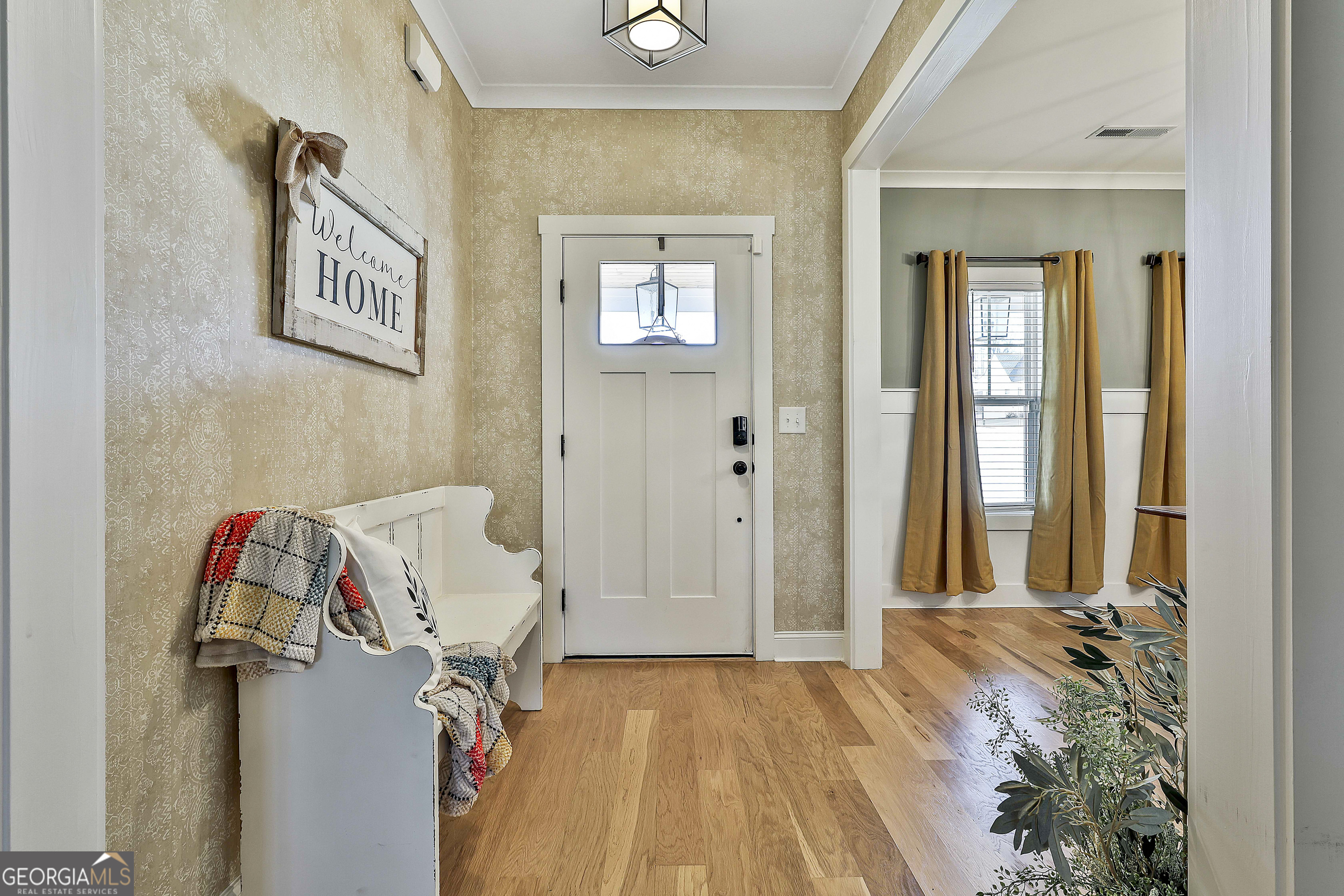 255 Werner Way Senoia, GA 30276 - Photo 9 of 47 a view of a bedroom with wooden floor and closet