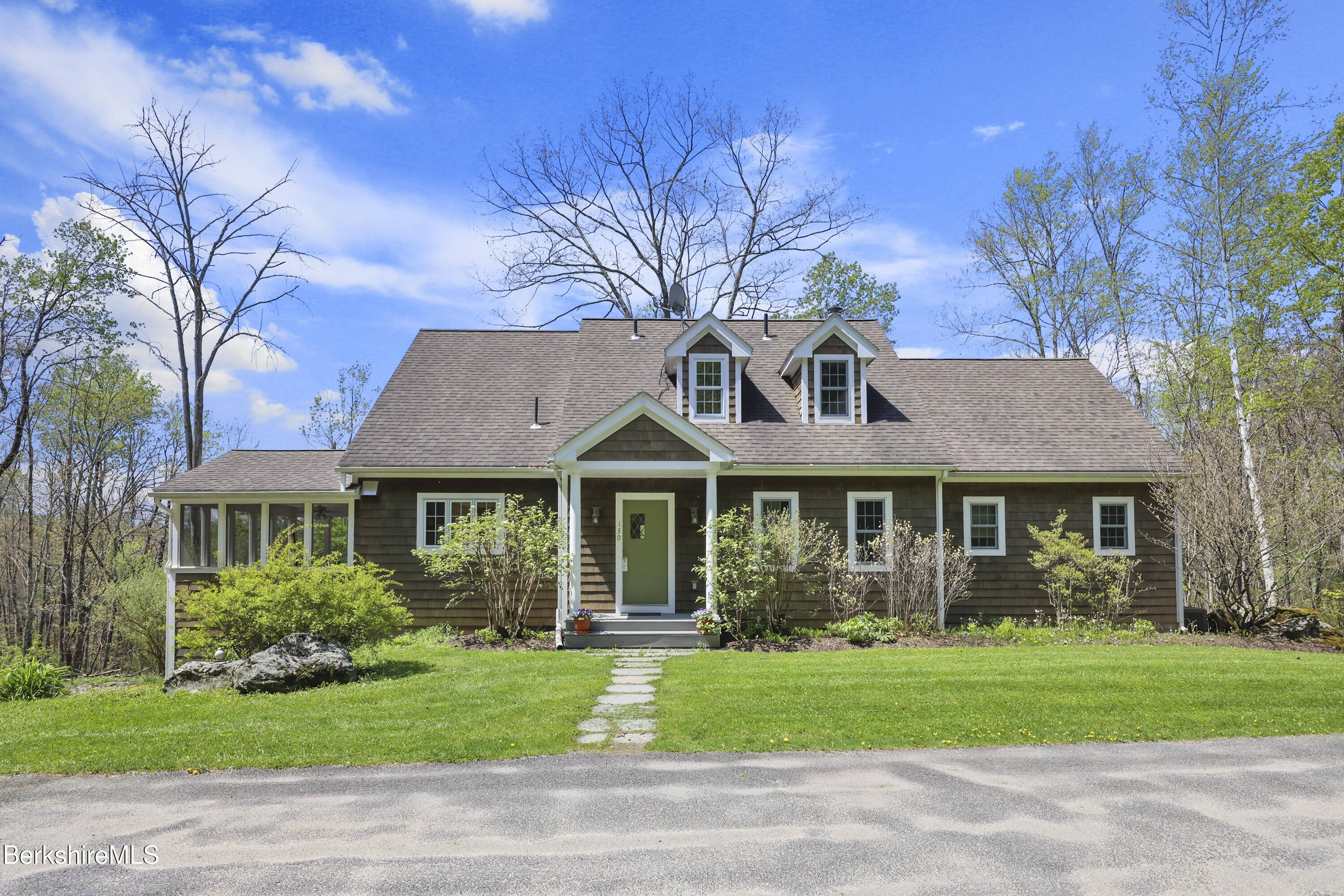 130 E Road Alford, MA 01266 - Photo 1 of 29 a front view of a house with a garden
