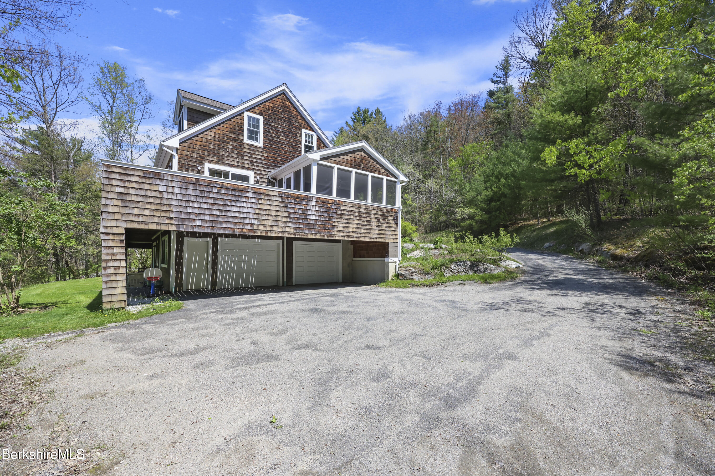 130 E Road Alford, MA 01266 - Photo 24 of 29 a front view of a house with a yard and garage