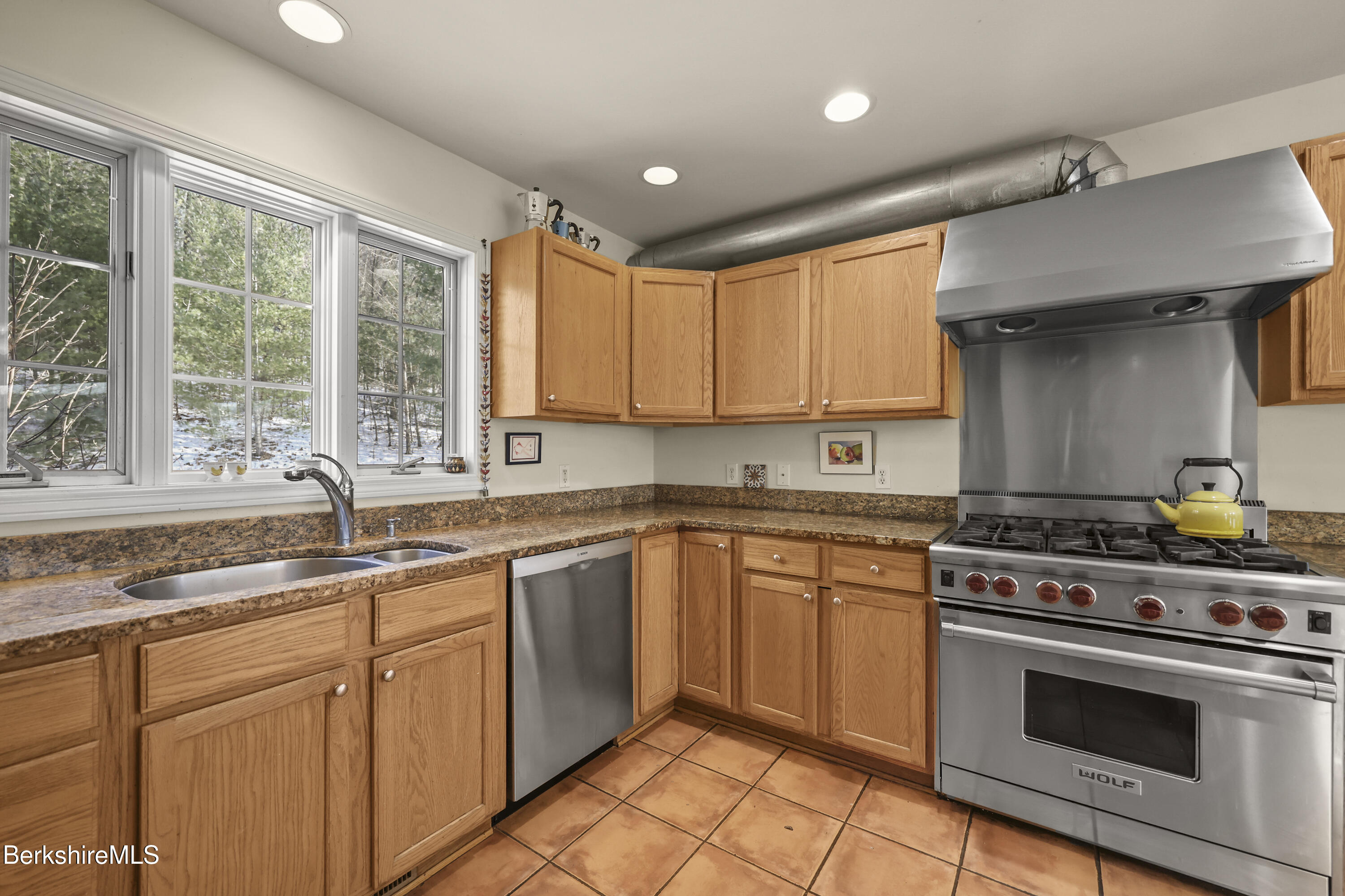 130 E Road Alford, MA 01266 - Photo 8 of 29 a kitchen with granite countertop a sink stainless steel appliances and cabinets