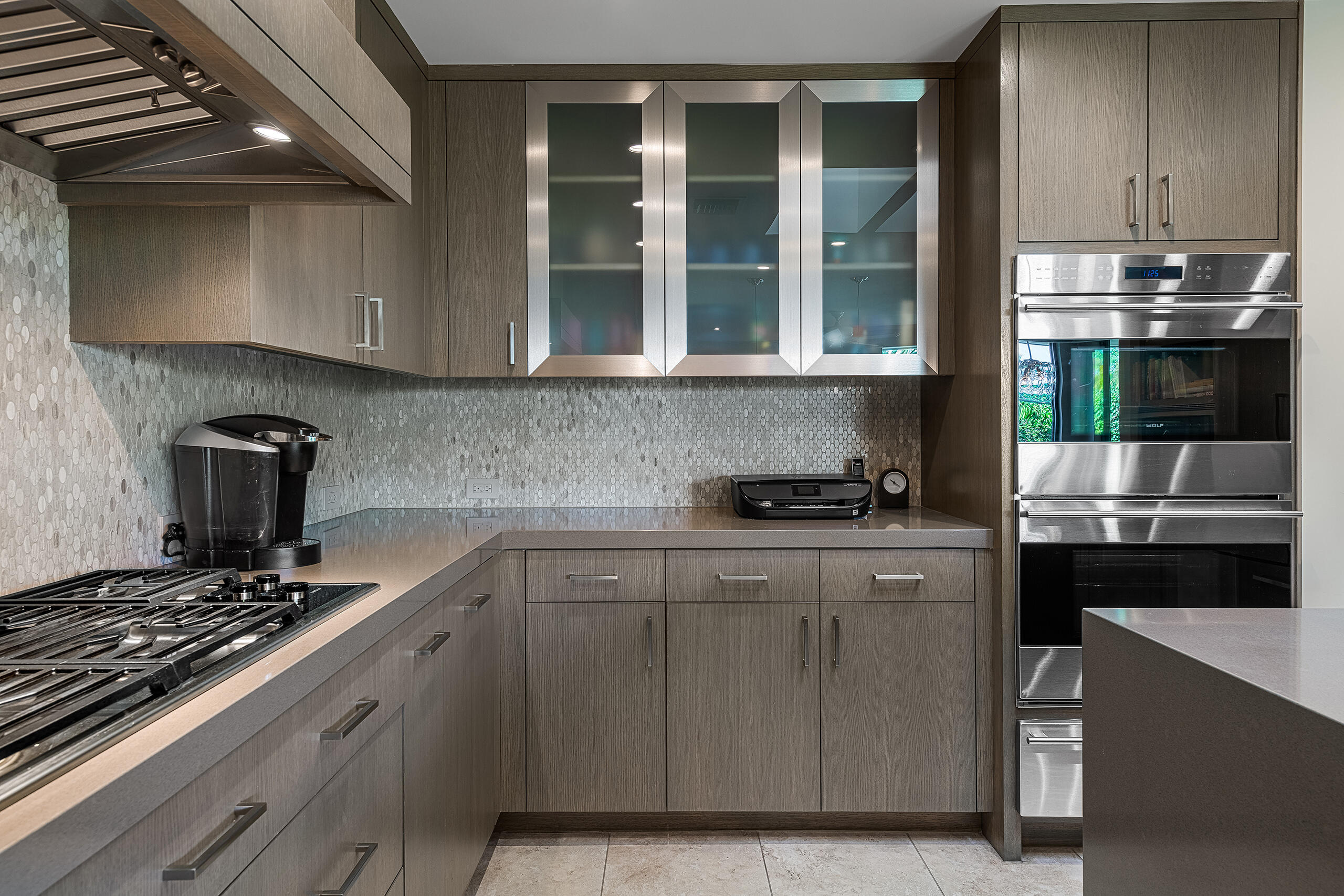 18 Creekside Drive Rancho Mirage, CA 92270 - Photo 15 of 40 a kitchen with stainless steel appliances granite countertop a stove and a sink