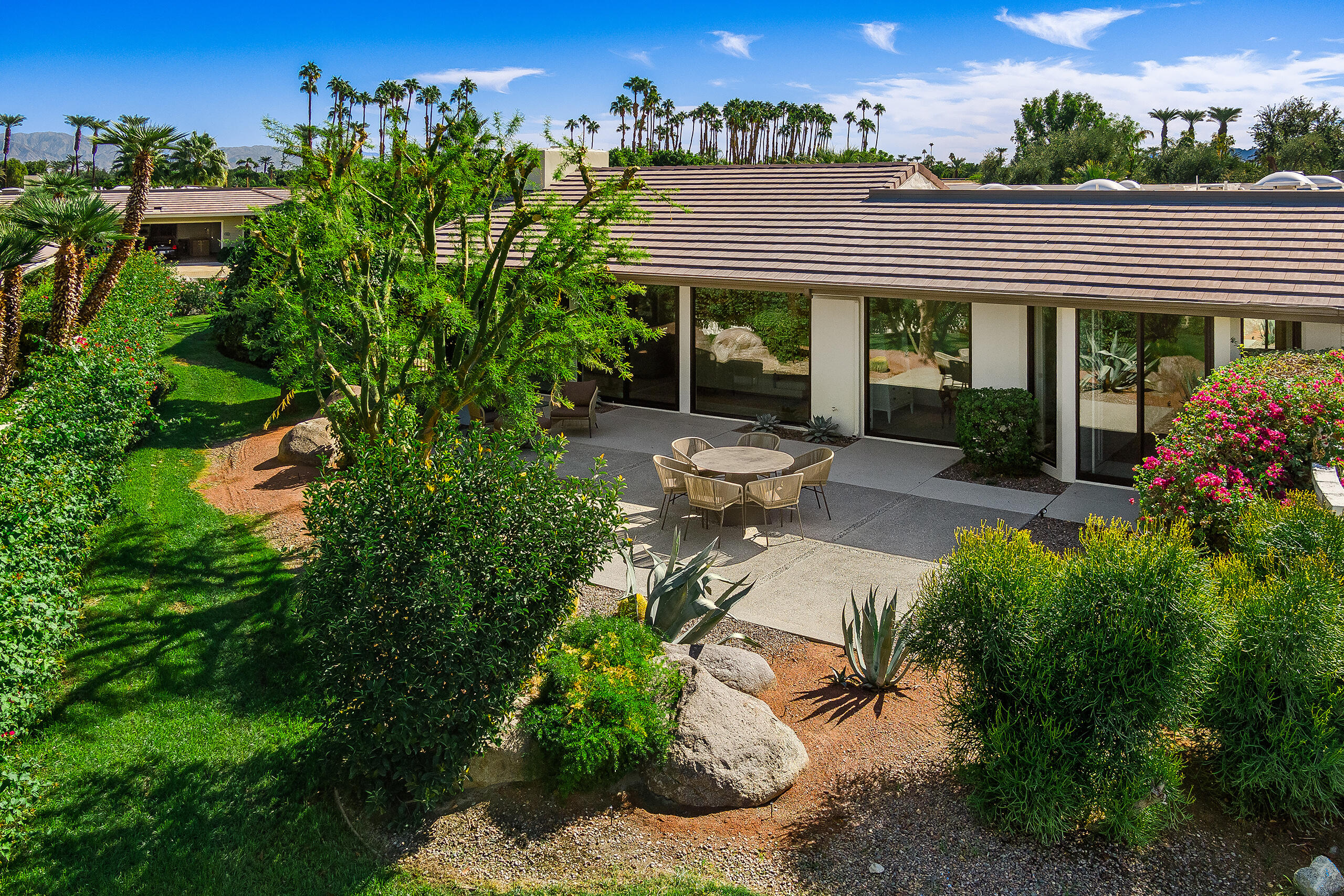 18 Creekside Drive Rancho Mirage, CA 92270 - Photo 19 of 40 an aerial view of a house with garden space and outdoor seating
