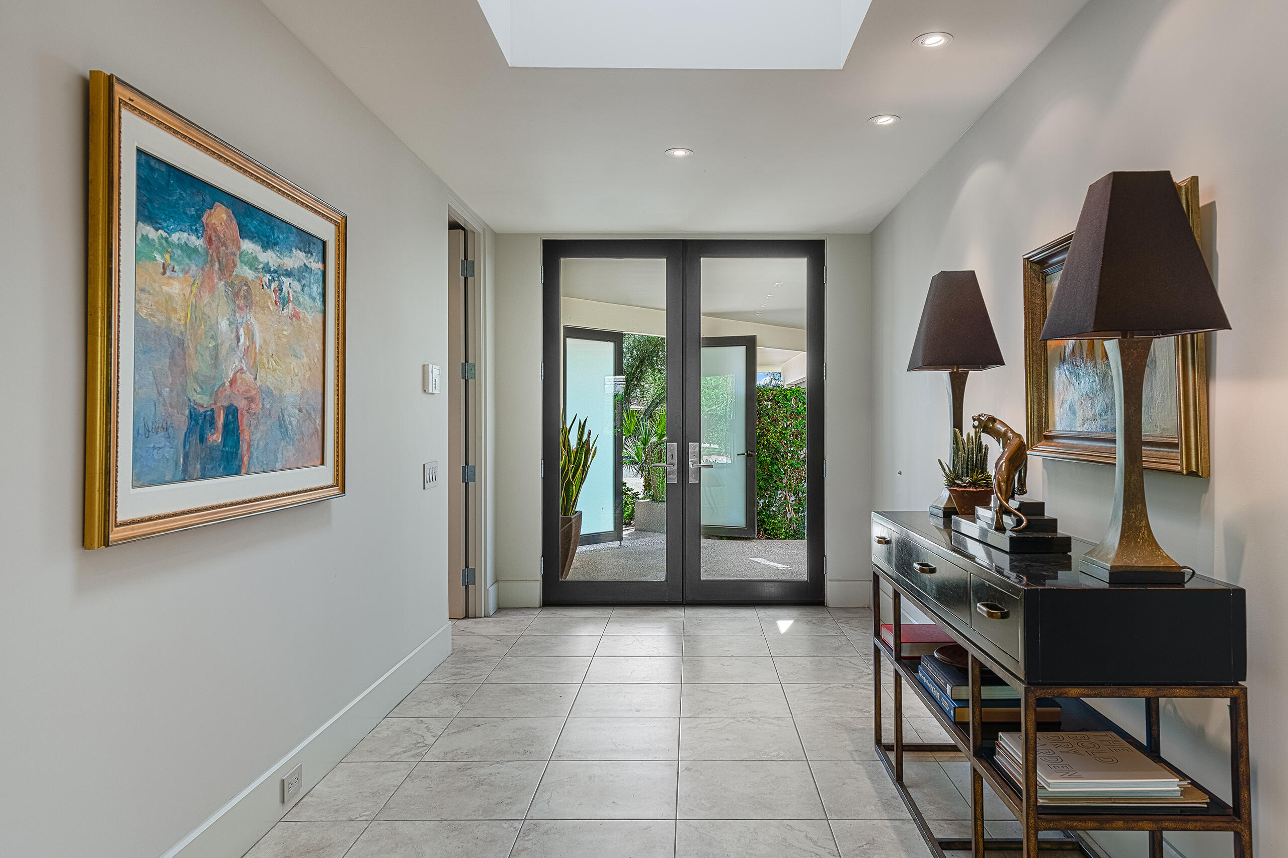 18 Creekside Drive Rancho Mirage, CA 92270 - Photo 3 of 40 a room with furniture and a window