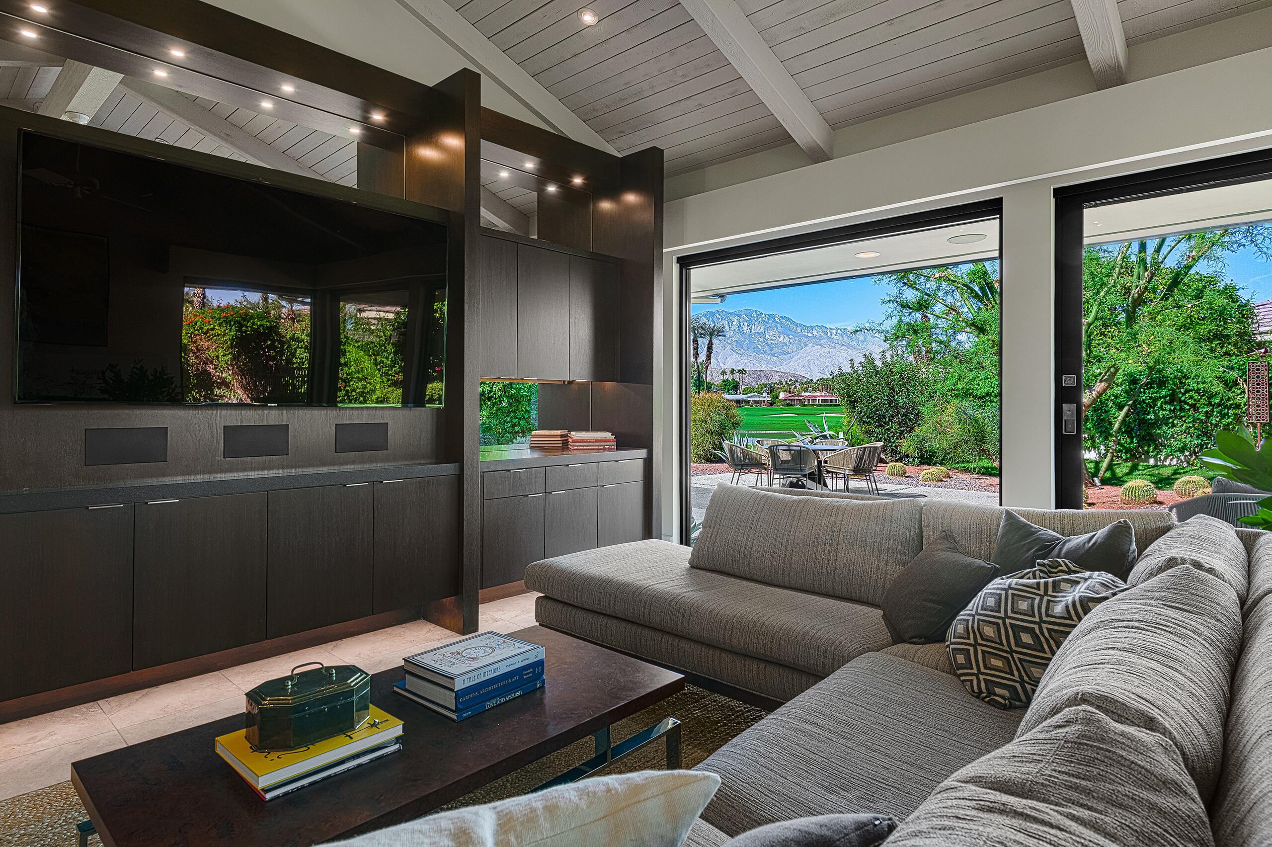 18 Creekside Drive Rancho Mirage, CA 92270 - Photo 7 of 40 a living room with furniture and a flat screen tv
