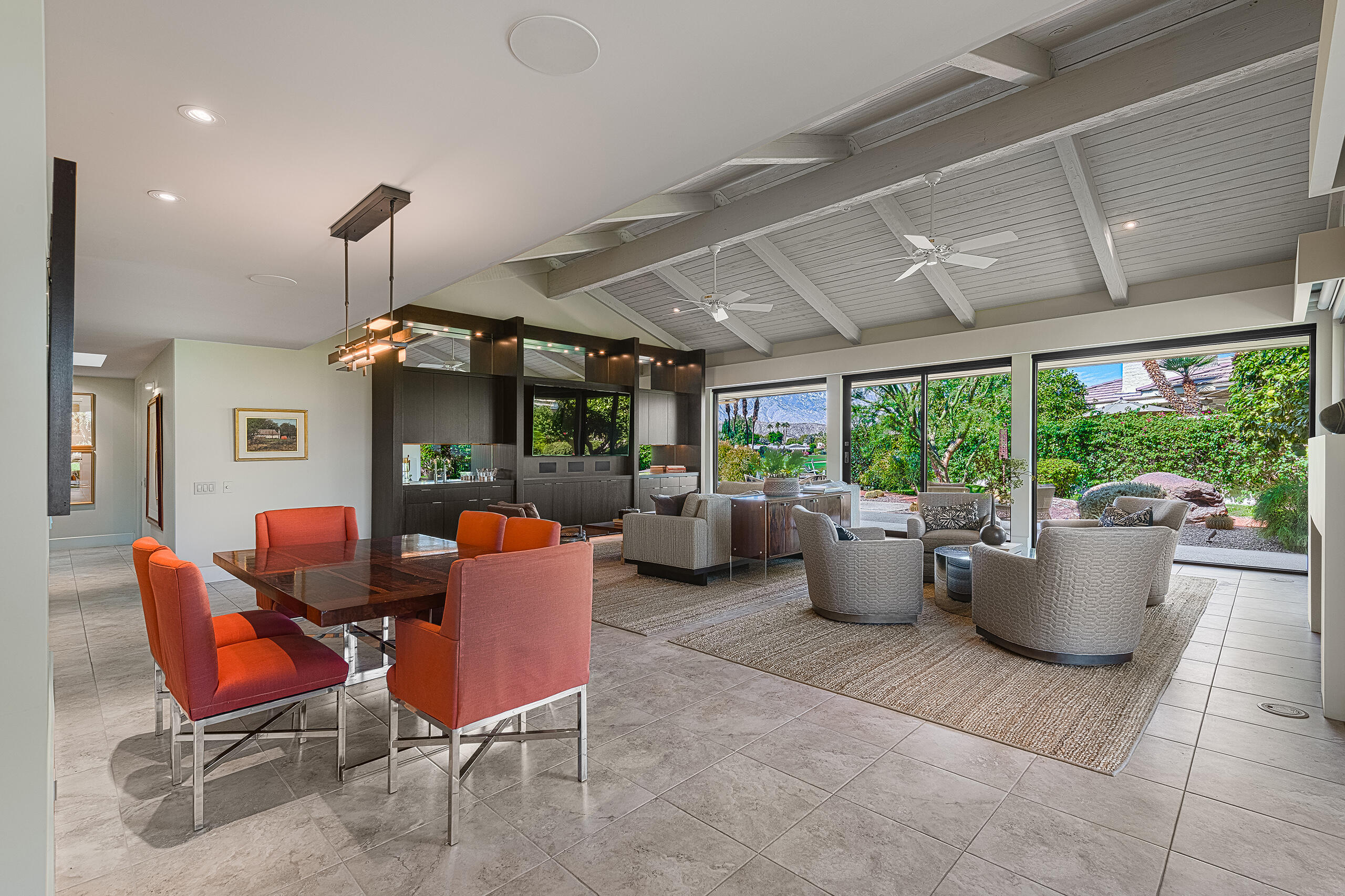 18 Creekside Drive Rancho Mirage, CA 92270 - Photo 9 of 40 a dining room with furniture and a floor to ceiling window