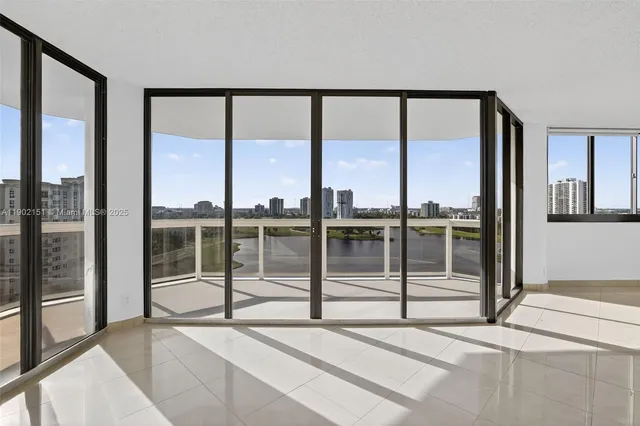 a view of a balcony with floor to ceiling window