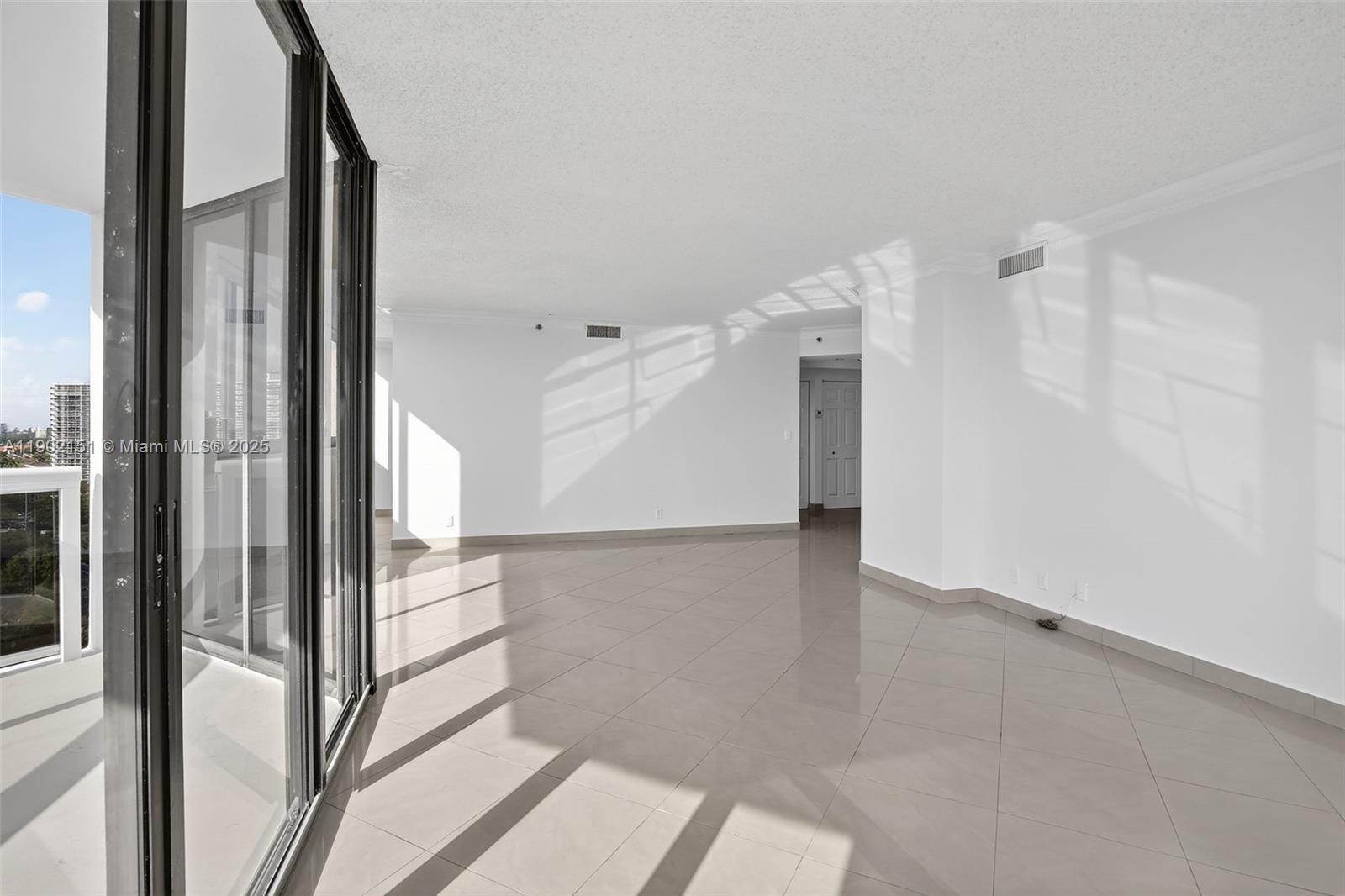 20185 East Country Club Drive, Unit 1405 Aventura, FL 33180 - Photo 12 of 67 a view of entryway and hall with wooden floor