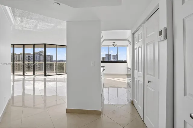 a view of a room with window and floor to ceiling window