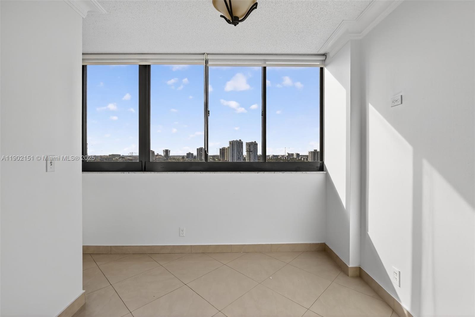 20185 East Country Club Drive, Unit 1405 Aventura, FL 33180 - Photo 28 of 67 a view of a window in a room