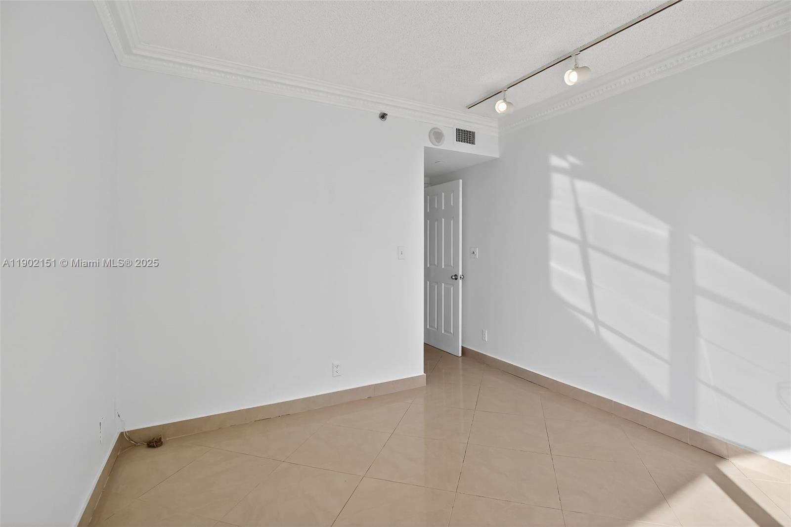 20185 East Country Club Drive, Unit 1405 Aventura, FL 33180 - Photo 31 of 67 a view of an empty room