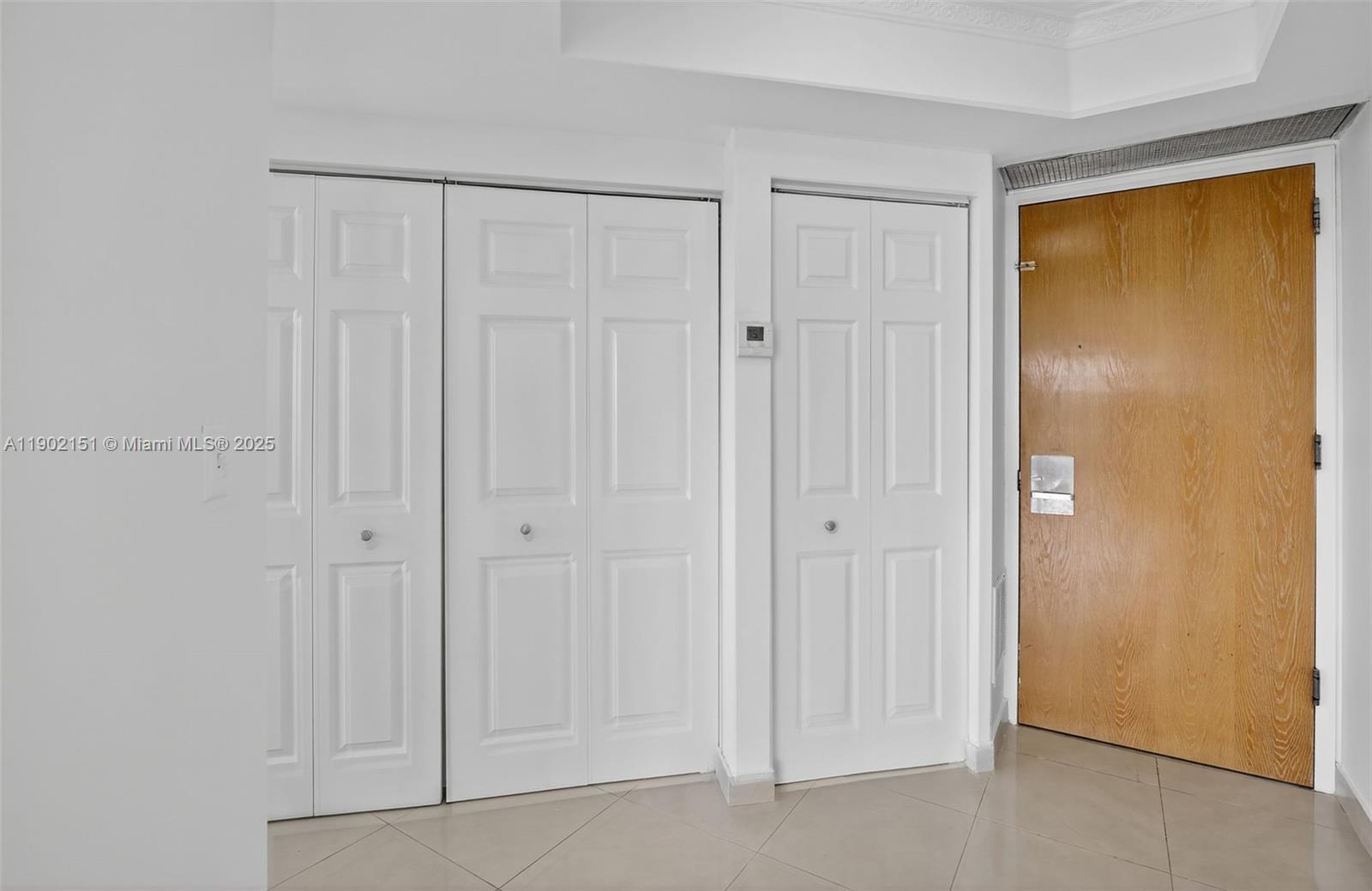 20185 East Country Club Drive, Unit 1405 Aventura, FL 33180 - Photo 32 of 67 a view of a room with an empty shower