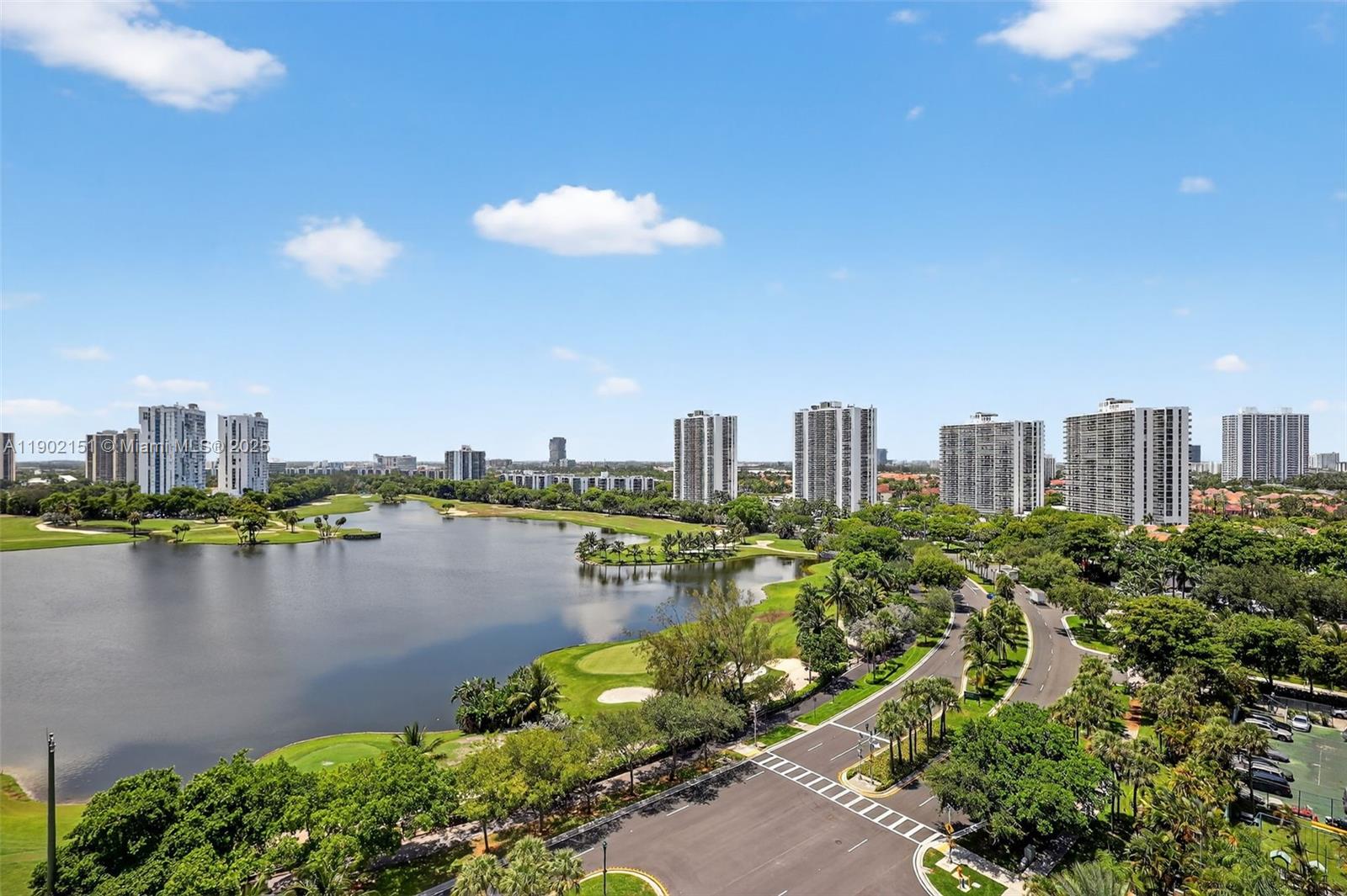 20185 East Country Club Drive, Unit 1405 Aventura, FL 33180 - Photo 4 of 67 a view of a city with a lake