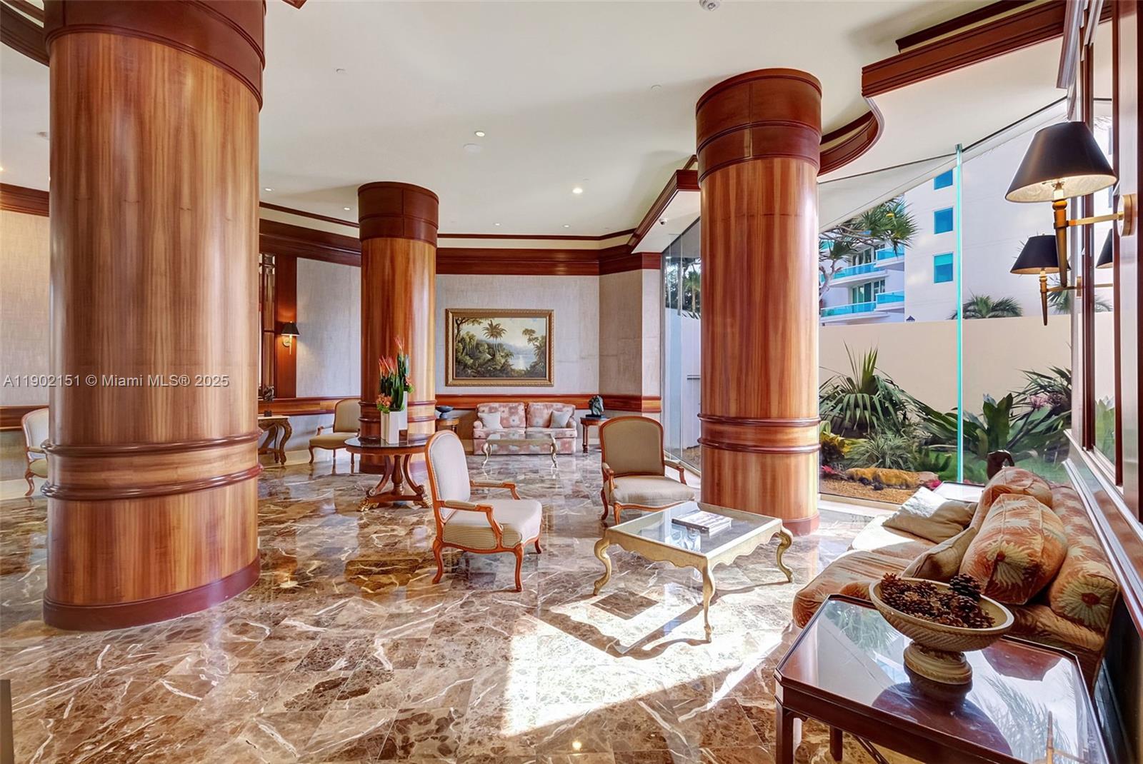 20185 East Country Club Drive, Unit 1405 Aventura, FL 33180 - Photo 45 of 67 a living room with furniture a window and a fireplace