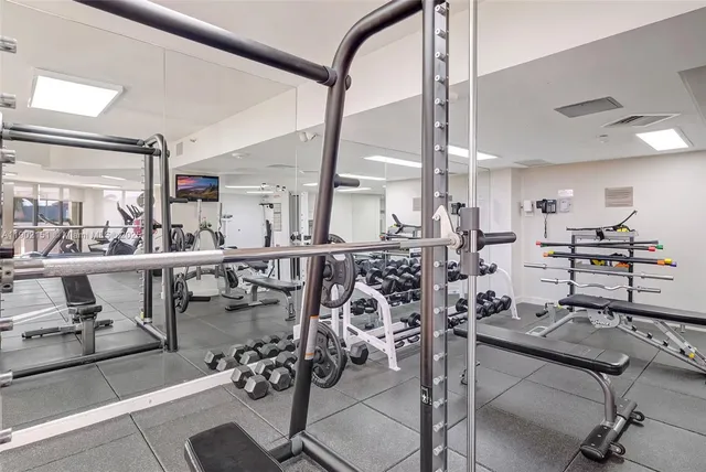 a view of a balcony with floor to ceiling window