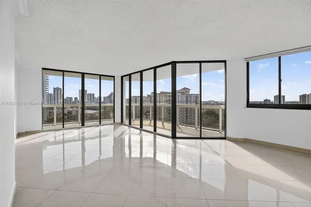 an empty room with windows