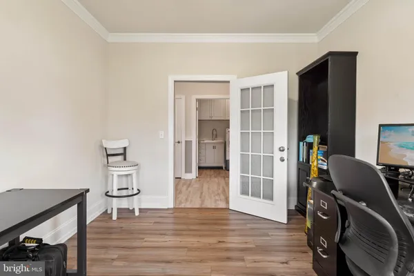 a view of a livingroom with furniture and wooden floor
