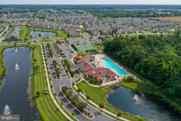 an aerial view of a swimming pool and outdoor space