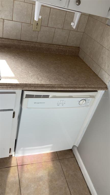 3718 West McKay Avenue, Unit 206 Tampa, FL 33609 - Photo 13 of 21 a view of a utility room with cabinets