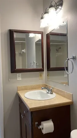a bathroom with a shower and a bathtub